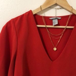 H&M rusty red flowy blouse